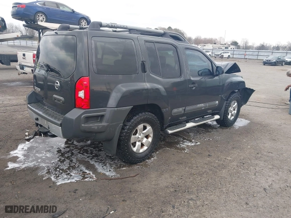2011 Nissan Xterra Pro-4X with VIN 5N1AN0NW1BC506369, listed as a IAAI auction lot 41802083 with 133,107 mi miles. Bid and sale history available at carsss.com. Image 4.