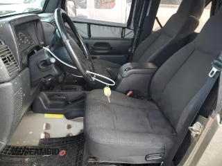 2003 Jeep Wrangler X с VIN 1J4FA39S03P349713, выставлен на аукционе Copart как лот 55768995 с пробегом 187 266 миль миль и Списание • Salvage title. История ставок и продаж доступна на DreamBid. Изображение 7.
