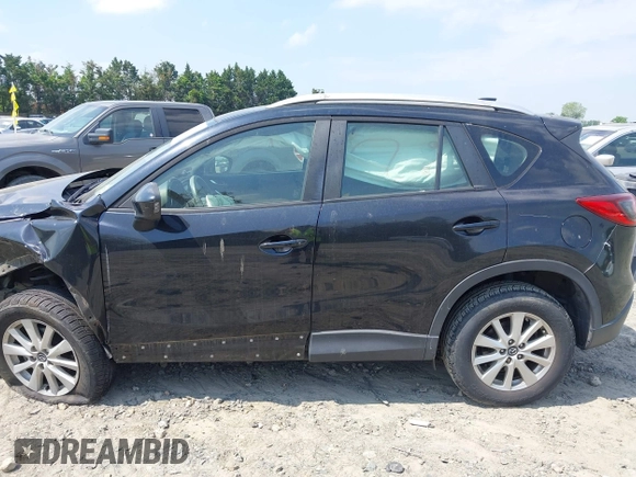 2014 Mazda CX-5 Sport with VIN JM3KE2BE3E0405976, listed as a IAAI auction lot 42161069 with 66,301 mi miles and . Bid and sale history available at carsss.com. Image 14.