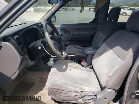 2000 Nissan Frontier XE with VIN 1N6ED27T5YC426456, listed as a Copart auction lot 54411425 with 117,600 mi miles and Salvage title. Bid and sale history available at DreamBid. Image 7.