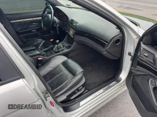 1999 BMW 5 Series 540i z VIN WBADN5333XGC91598, wystawiony jako Copart lot #61690655 z przebiegiem 174 320 mil mil oraz Szkoda całkowita • Salvage title. Historia ofert i sprzedaży dostępna na DreamBid. Obrazek 5.