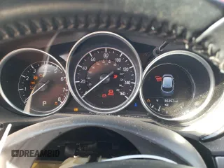 2021 Mazda CX-9 Sport with VIN JM3TCBBY5M0506083, listed as a Copart auction lot 64380963 with 36,397 mi miles and . Bid and sale history available at DreamBid. Image 9.