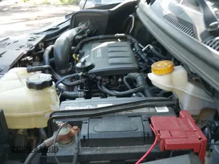 2016 Chevrolet Sonic LT z VIN 1G1JC6SB5G4183663, wystawiony jako IAAI lot #42203145 z przebiegiem 138 645 mil mil oraz . Historia ofert i sprzedaży dostępna na DreamBid. Obrazek 19.