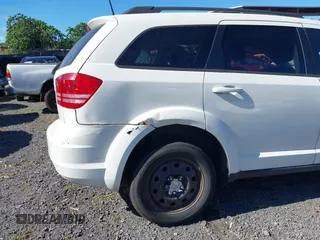 2019 Dodge Journey SE Value with VIN 3C4PDCAB2KT810207, listed as a IAAI auction lot 40991409 with Not Provided miles and . Bid and sale history available at DreamBid. Image 18.