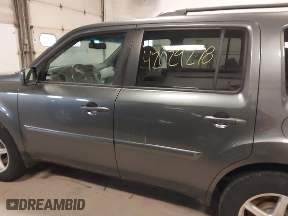 2011 Honda Pilot EX-L with VIN 5FNYF4H55BB039079, listed as a IAAI auction lot 42029278 with 173,216 mi miles. Bid and sale history available at carsss.com. Image 14.