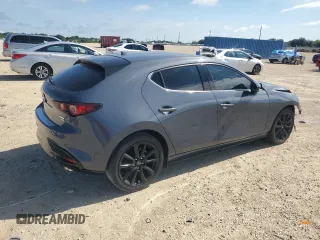 2023 Mazda 3 2.5 Turbo with VIN JM1BPBJY6P1618707, listed as a Copart auction lot 64999854 with 1,671 mi miles and Salvage title. Bid and sale history available at DreamBid. Image 3.