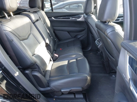 2023 Cadillac XT6 FWD Premium Luxury with VIN 1GYKPCRS1PZ105964, listed as a IAAI auction lot 41525039 with 70,603 mi miles and . Bid and sale history available at DreamBid. Image 8.