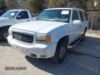 2000 Cadillac Escalade z VIN 1GYEK13R9YR149637, wystawiony jako IAAI lot #41599887 z przebiegiem 206 835 mil mil oraz . Historia ofert i sprzedaży dostępna na DreamBid. Obrazek 2.