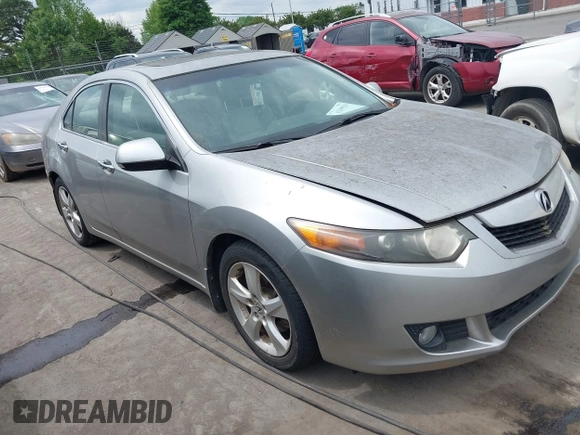 2010 Acura TSX with VIN JH4CU2F60AC019462, listed as a IAAI auction lot 42109261 with 112,131 mi miles. Bid and sale history available at carsss.com. Image 1.