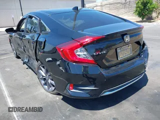 2019 Honda Civic EX z VIN 19XFC1F3XKE215534, wystawiony jako IAAI lot #42100714 z przebiegiem 31 808 mil mil oraz . Historia ofert i sprzedaży dostępna na DreamBid. Obrazek 3.