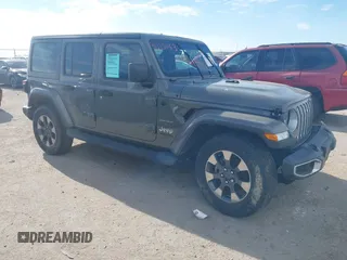2018 Jeep Wrangler Unlimited Sahara z VIN 1C4HJXEN9JW215890, wystawiony jako IAAI lot #41215063 z przebiegiem 39 567 mil mil oraz . Historia ofert i sprzedaży dostępna na DreamBid. Obrazek 1.