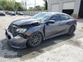 2017 Honda Civic Sedan LX with VIN 19XFC2F52HE062826, listed as a Copart auction lot 50692755 with 123,569 mi miles and Salvage Title. Bid and sale history available at carsss.com. Image 1.