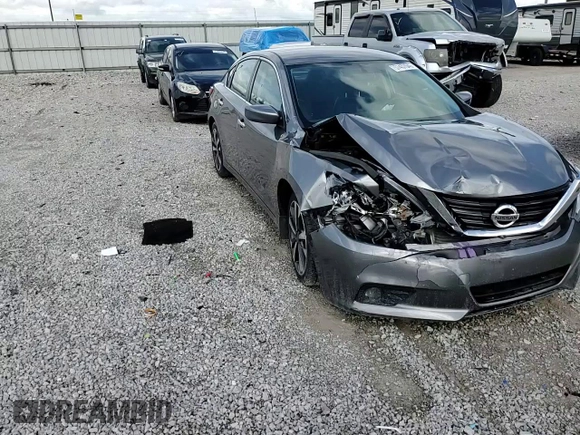 2016 Nissan Altima SR with VIN 1N4AL3AP3GC238030, listed as a Copart auction lot 57457045 with 128,811 mi miles and Salvage title. Bid and sale history available at DreamBid. Image 13.