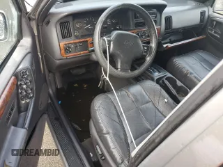 1998 Jeep Grand Cherokee Limited with VIN 1J4GZ78S2WC222768, listed as a Copart auction lot 73942154 with 0 mi miles and Salvage Title. Bid and sale history available at carsss.com. Image 8.