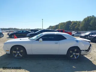 2013 Dodge Challenger SXT with VIN 2C3CDYAG6DH737253, listed as a IAAI auction lot 40615411 with 133,973 mi miles. Bid and sale history available at carsss.com. Image 14.