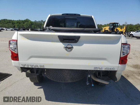 2021 Nissan Titan SV с VIN 1N6AA1EDXMN527522, выставлен на аукционе Copart как лот 52826715 с пробегом 79 450 миль миль и Списание • Salvage title. История ставок и продаж доступна на DreamBid. Изображение 6.
