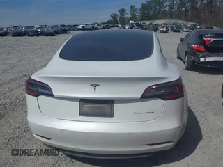 2022 Tesla Model 3 Long Range with VIN 5YJ3E1EB0NF106570, listed as a IAAI auction lot 41832622 with 52,679 mi miles and . Bid and sale history available at DreamBid. Image 16.