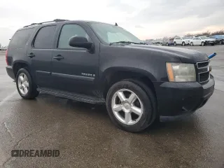 2007 Chevrolet Tahoe LTZ with VIN 1GNFC13067R267773, listed as a Copart auction lot 41653905 with 197,538 mi miles and Salvage title. Bid and sale history available at DreamBid. Image 4.