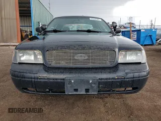 2004 Ford Police Interceptor with VIN 2FAHP71W14X138220, listed as a Copart auction lot 59930385 with 169,302 mi miles and Salvage title. Bid and sale history available at DreamBid. Image 5.