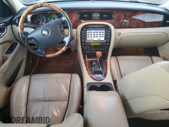 2007 Jaguar XJ with VIN SAJWA71B27SH17096, listed as a Copart auction lot 78863314 with 132,779 mi miles and Salvage Title. Bid and sale history available at carsss.com. Image 8.