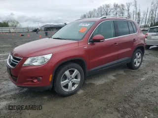 2010 Volkswagen Tiguan Wolfsburg Edition z VIN WVGAV7AX0AW004182, wystawiony jako Copart lot #52974675 z przebiegiem 265 499 mil mil oraz Czysty tytuł • Clean title. Historia ofert i sprzedaży dostępna na DreamBid. Obrazek 1.