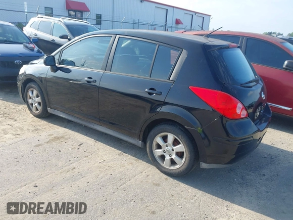 2007 Nissan Versa 1.8 S with VIN 3N1BC13E97L359537, listed as a IAAI auction lot 42127935 with 128,891 mi miles. Bid and sale history available at carsss.com. Image 3.