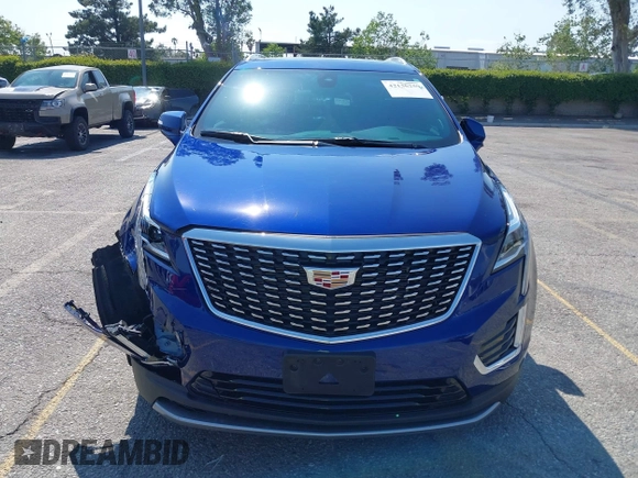 2023 Cadillac XT5 FWD Premium Luxury z VIN 1GYKNCRS3PZ176654, wystawiony jako IAAI lot #42136259 z przebiegiem 20 403 mil mil oraz . Historia ofert i sprzedaży dostępna na DreamBid. Obrazek 13.