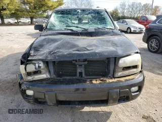 2003 Chevrolet TrailBlazer LTZ with VIN 1GNDT13S332196883, listed as a Copart auction lot 77031124 with 167,328 mi miles and Salvage Title. Bid and sale history available at DreamBid. Image 5.