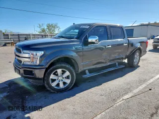 2018 Ford F-150 XL with VIN 1FTEW1EG6JFC62863, listed as a Copart auction lot 59218255 with 125,198 mi miles and Salvage title. Bid and sale history available at DreamBid. Image 1.