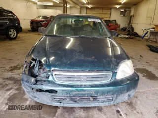 1999 Honda Civic VP z VIN 2HGEJ6611XH594868, wystawiony jako Copart lot #45193835 z przebiegiem 180 914 mil mil oraz Szkoda całkowita • Salvage title. Historia ofert i sprzedaży dostępna na DreamBid. Obrazek 5.