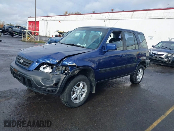 1999 Honda CR-V EX with VIN JHLRD1863XC046654, listed as a IAAI auction lot 40871270 with 220,642 mi miles. Bid and sale history available at carsss.com. Image 17.