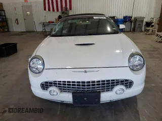 2002 Ford Thunderbird Hardtop Premium with VIN 1FAHP60A32Y125580, listed as a Copart auction lot 77493514 with 74,619 mi miles and Salvage Title. Bid and sale history available at DreamBid. Image 5.