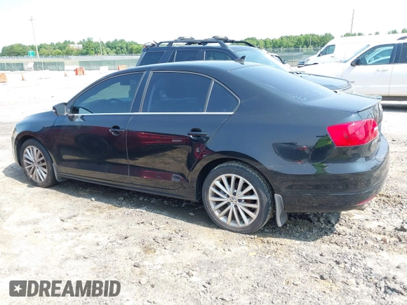 2013 Volkswagen Jetta TDI w/Premium/Nav with VIN 3VWLL7AJ1DM396749, listed as a IAAI auction lot 42403933 with 88,777 mi miles and . Bid and sale history available at DreamBid. Image 14.