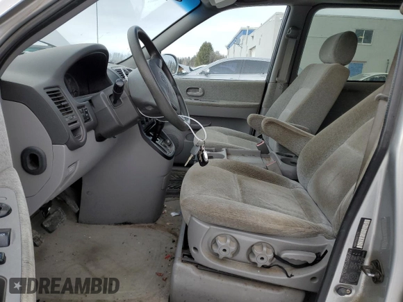 2005 Kia Sedona LX with VIN KNDUP131656722701, listed as a Copart auction lot 41604655 with 160,793 mi miles and Salvage Title. Bid and sale history available at carsss.com. Image 7.