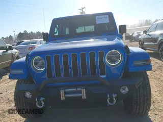 2022 Jeep Wrangler Unlimited Sahara z VIN 1C4JJXP64NW192452, wystawiony jako IAAI lot #41631295 z przebiegiem 23 738 mil mil oraz . Historia ofert i sprzedaży dostępna na DreamBid. Obrazek 12.