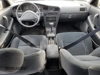 1990 Nissan Maxima z VIN JN1HJ01P8LT402950, wystawiony jako Copart lot #82714734 z przebiegiem 60 727 mil mil oraz Tytuł czysty. Historia ofert i sprzedaży dostępna na DreamBid. Obrazek 8.