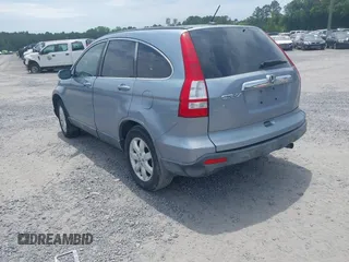 2008 Honda CR-V EX-L with VIN JHLRE387X8C051403, listed as a IAAI auction lot 42200808 with 207,237 mi miles and . Bid and sale history available at carsss.com. Image 3.