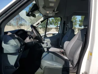 2019 Ford Transit Passenger XL with VIN 1FBVU4XMXKKA49423, listed as a Copart auction lot 52590185 with 183,289 mi miles and Clean Title. Bid and sale history available at DreamBid. Image 7.