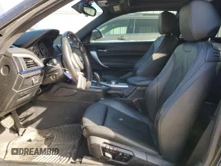 2015 BMW 2 Series M235i xDrive with VIN WBA1J9C53FV371160, listed as a Copart auction lot 77395844 with 148,064 mi miles and Clean Title. Bid and sale history available at carsss.com. Image 7.