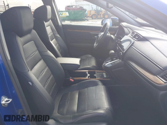 2020 Honda CR-V Touring with VIN 7FARW2H91LE012284, listed as a IAAI auction lot 41672460 with 28,207 mi miles and . Bid and sale history available at DreamBid. Image 5.
