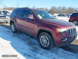 2018 Jeep Grand Cherokee Laredo E with VIN 1C4RJFAG8JC127274, listed as a IAAI auction lot 41394989 with 106,608 mi miles. Bid and sale history available at carsss.com. Image 1.