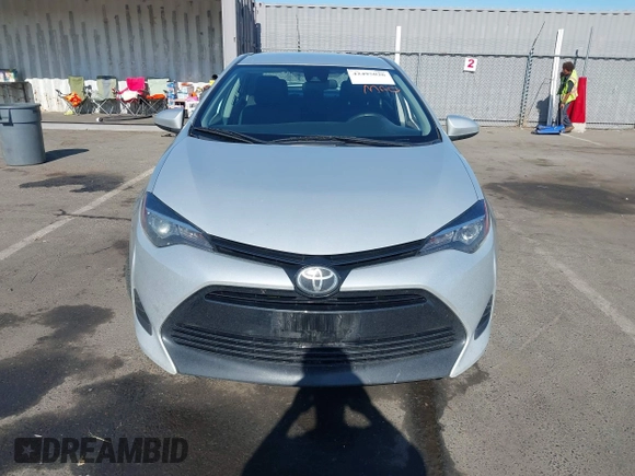 2018 Toyota Corolla L with VIN 2T1BURHE8JC079085, listed as a IAAI auction lot 42495026 with 376,657 mi miles and . Bid and sale history available at DreamBid. Image 12.