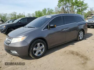 2012 Honda Odyssey Touring with VIN 5FNRL5H92CB134917, listed as a Copart auction lot 54437875 with 139,318 mi miles and Salvage Title. Bid and sale history available at DreamBid. Image 1.
