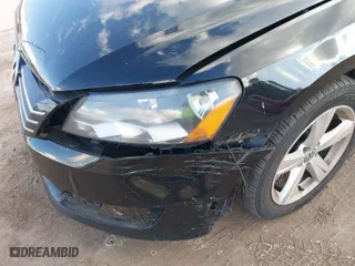 2014 Volkswagen Passat SE w/Sunroof with VIN 1VWBT7A30EC055472, listed as a IAAI auction lot 40975011 with 133,967 mi miles. Bid and sale history available at carsss.com. Image 13.