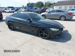 2015 BMW 4 Series 428i with VIN WBA3N7C59FK223386, listed as a IAAI auction lot 41525282 with 72,852 mi miles. Bid and sale history available at carsss.com. Image 1.