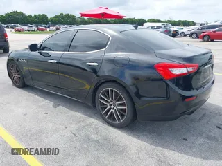2015 Maserati Ghibli with VIN ZAM57XSA1F1144073, listed as a IAAI auction lot 42770723 with 105,782 mi miles and . Bid and sale history available at DreamBid. Image 3.