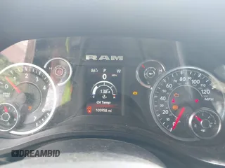 2021 Ram 1500 Lone Star z VIN 1C6RREBT0MN828129, wystawiony jako IAAI lot #42268306 z przebiegiem 105 958 mil mil oraz . Historia ofert i sprzedaży dostępna na DreamBid. Obrazek 7.