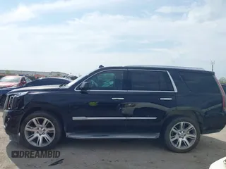 2015 Cadillac Escalade Luxury z VIN 1GYS4BKJ2FR260848, wystawiony jako IAAI lot #41895938 z przebiegiem 157 531 mil mil oraz . Historia ofert i sprzedaży dostępna na DreamBid. Obrazek 14.