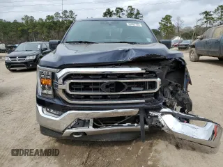 2021 Ford F-150 XL with VIN 1FTFW1E50MFA45896, listed as a Copart auction lot 46882735 with 57,041 mi miles and Salvage Title. Bid and sale history available at DreamBid. Image 5.