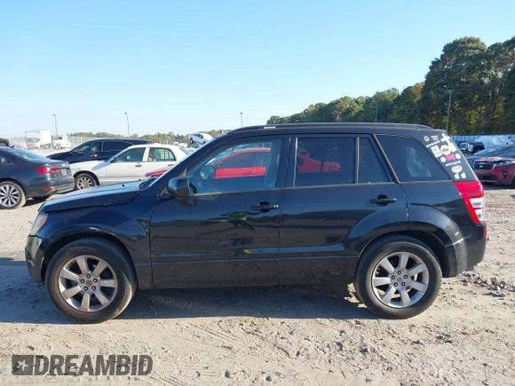 2011 Suzuki Grand Vitara Limited z VIN JS3TE0D72B4100152, wystawiony jako IAAI lot #40676416 z przebiegiem 193 097 mil mil oraz . Historia ofert i sprzedaży dostępna na DreamBid. Obrazek 14.